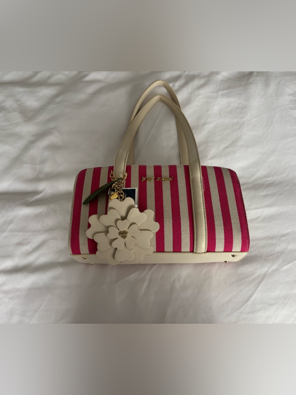 Betsey Johnson Pink and Cream Striped Satchel with Floral Charm